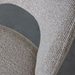 Close up stof eetkamerstoel Sakura van LABEL51 in Mushroom Royal Boucle met brons metalen onderstel bij Seinen Nieuwleusen